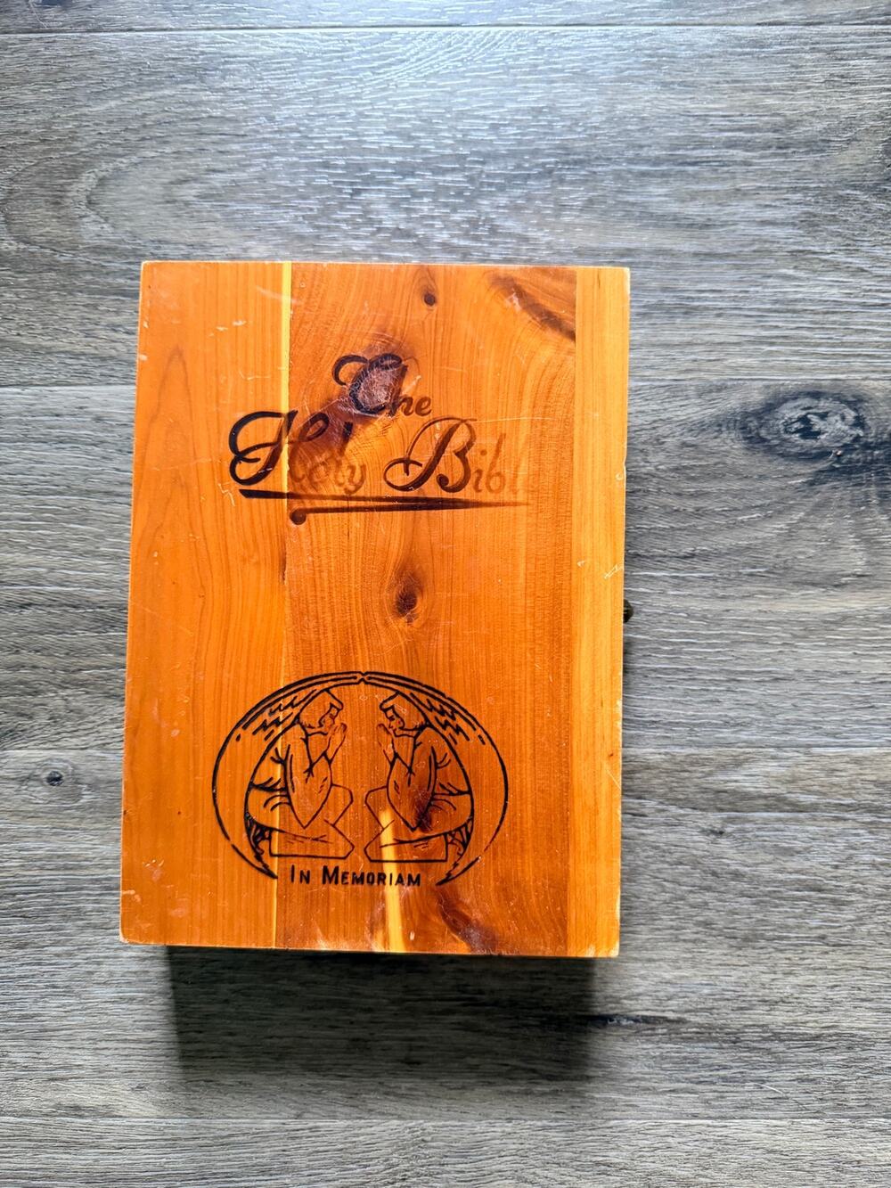 Vintage white memorial Bible in wood case